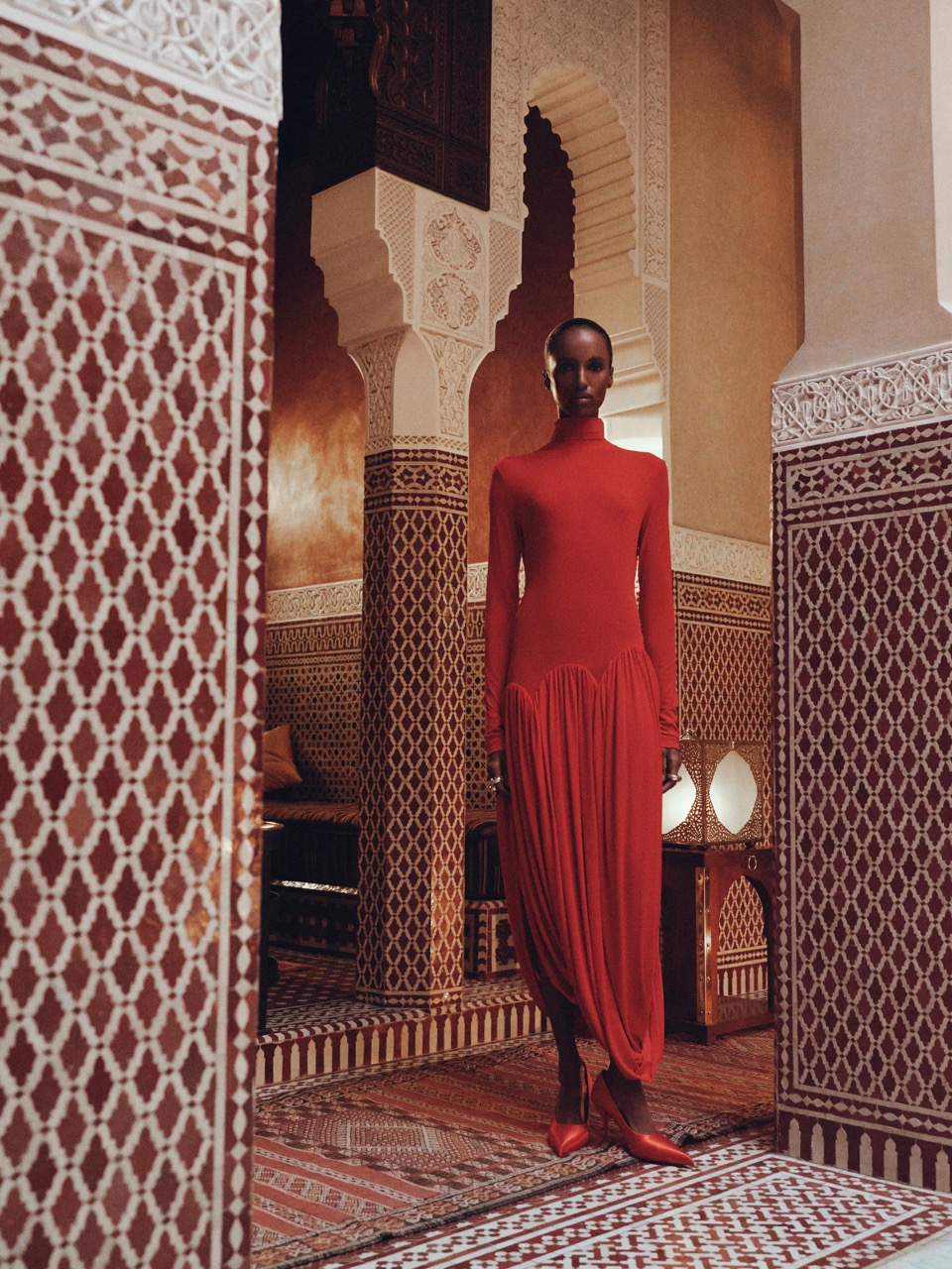Bibi wears a Ferragamo turtle-neck dress with tulip skirt ($3,700), Prada satin pumps ($1,170) and Lara Sonmez Lili ring ($630). Bibi Abdulkadir by Su Mustecaplioglu 9